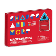 A red Magformers Shapes and More 20-piece set tin case with multicolored shapes inside.