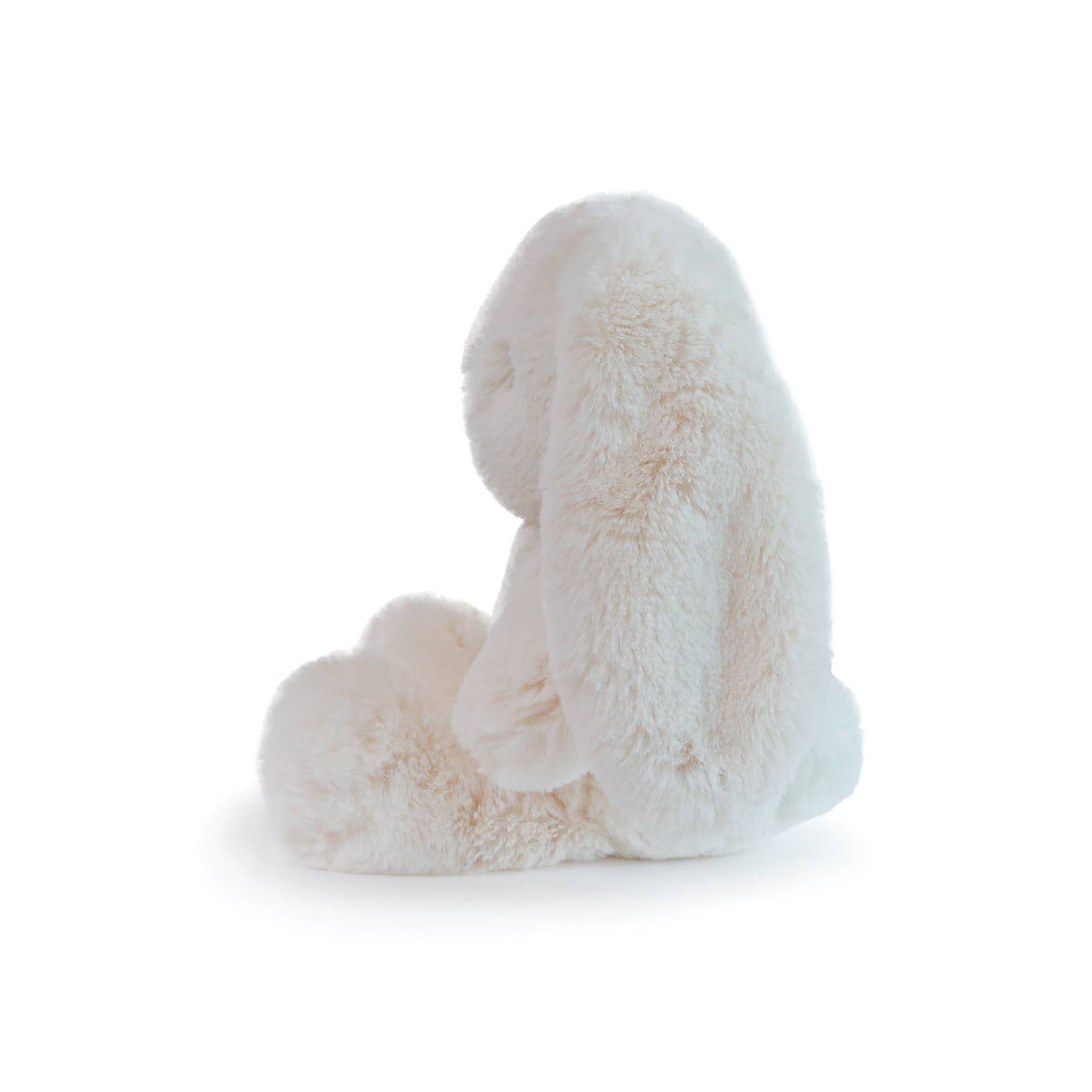 White fluffy dog toy on a white background