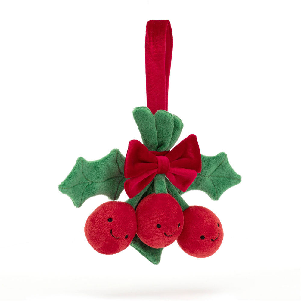 A plush toy resembling holly berries with a red cranberry bow and green leaves, with a hanging loop.