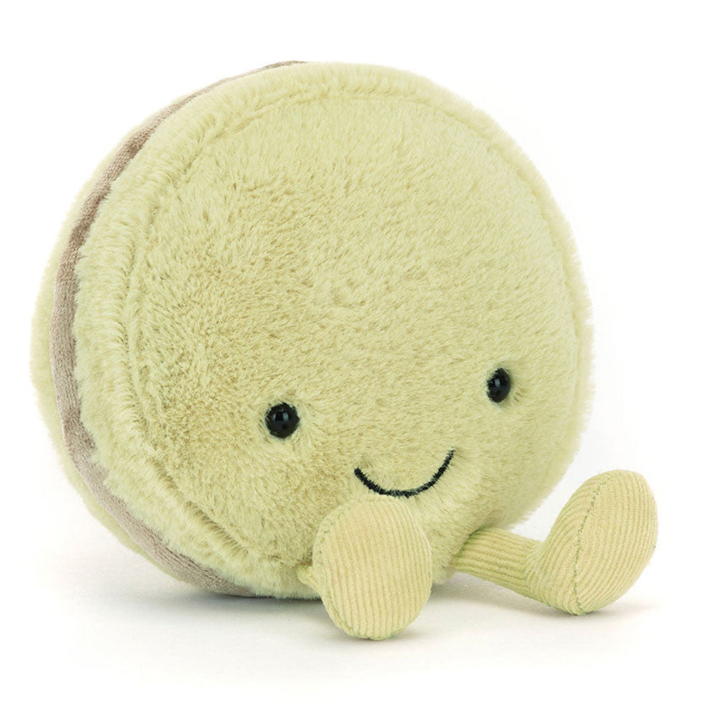 Jellycat Plush toy resembling a macaron with a smiling face on a white background