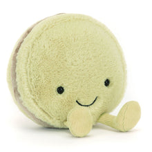 Jellycat Plush toy resembling a macaron with a smiling face on a white background