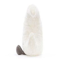 White plush toy with gray feet on a white background