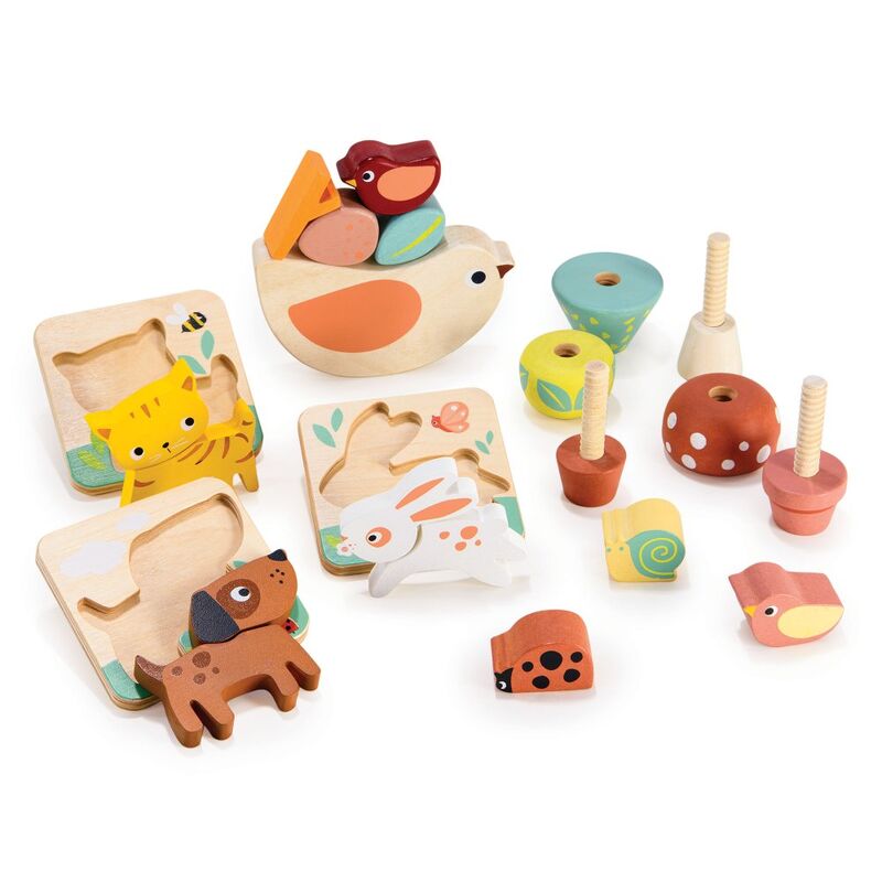 Set of wooden toys with animal shapes and colorful elements on a white background