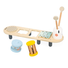 A caterpillar-shaped wooden musical activity toy with integrated sound activities, including a maraca, xylophone, bell, rain stick, and guiro, with a detachable head and rattles.