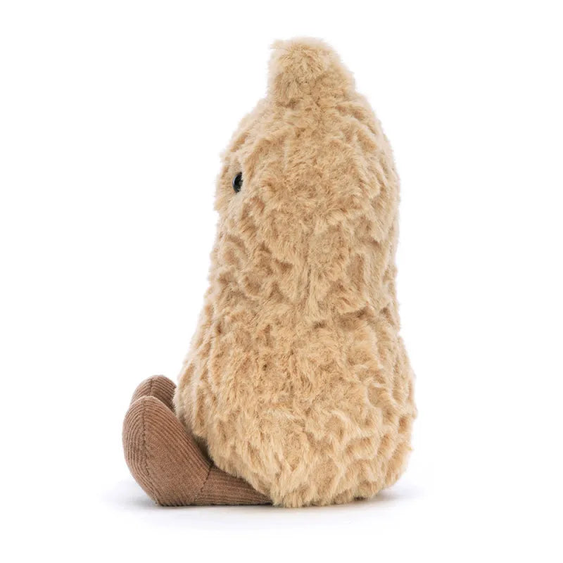 Plush toy resembling a peanut on a white background