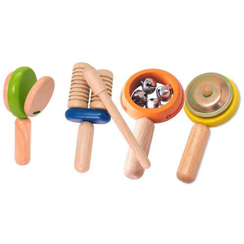 Four child's wooden instruments including bells and clacker.