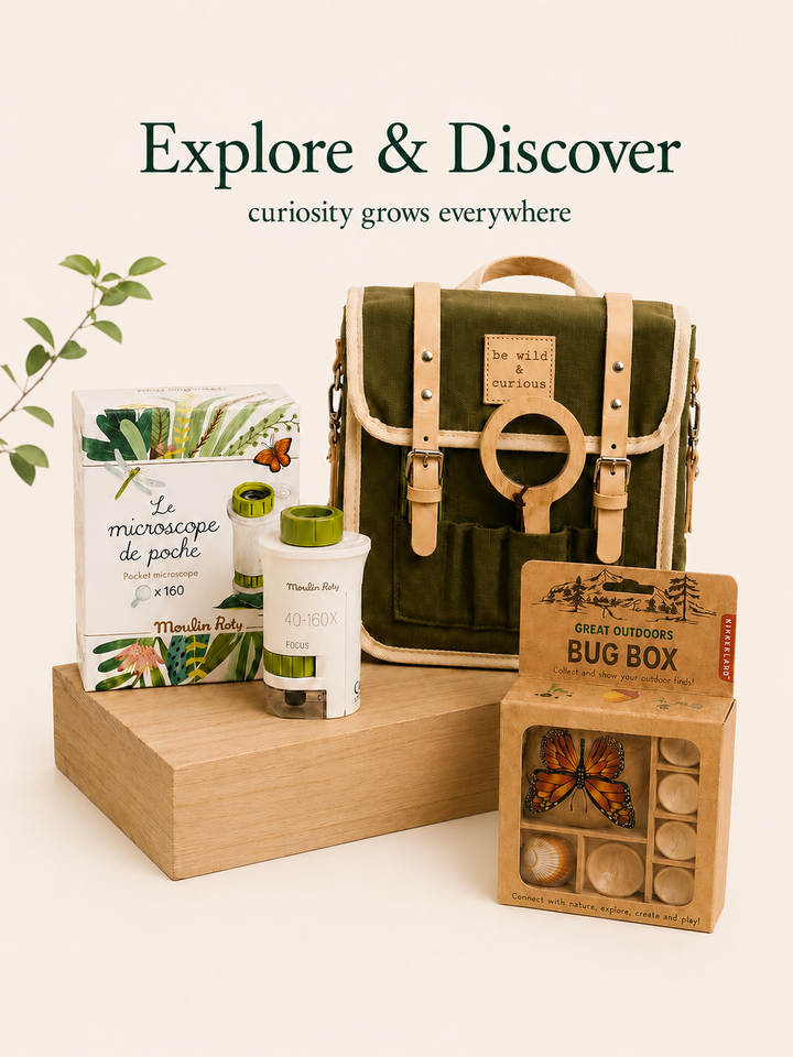 Green backpack, microscope, and bug box with 'Explore & Discover' text on a light background