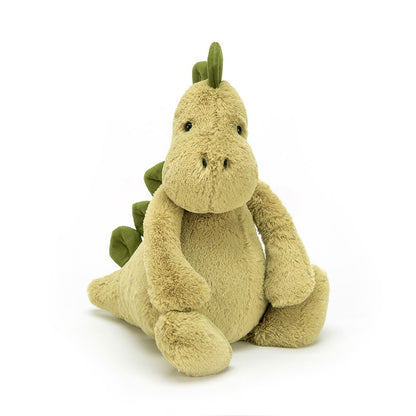 Jellycat Bashful Dino Medium plush toy with soft green textured fur, embroidered features and friendly dinosaur design
