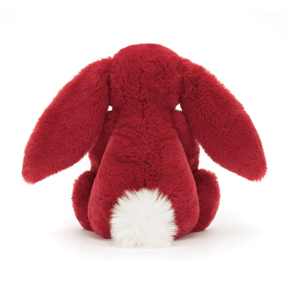 Jellycat Red plush bunny toy with fluffy white bobtail on a white background