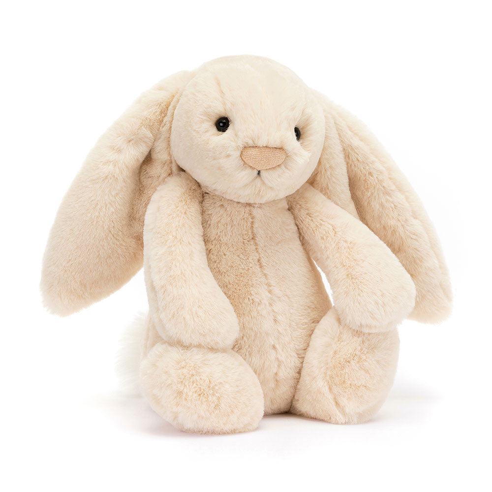 A plush toy resembling a beige bunny with long ears, a round face, and a small nose with a sparkle detail.