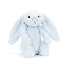 A plush toy in the form of a blue bunny with floppy ears and a soft body, designed for cuddling.