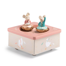 Wooden music box with two mouse figures on a white background