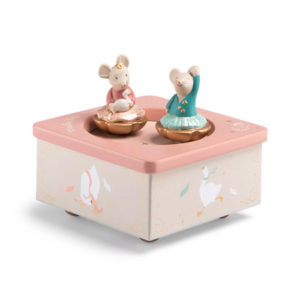 Wooden music box with two mouse figures on a white background