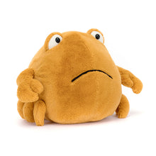 A plush toy crab with a soft orange shell, big eyes, and detailed claws.