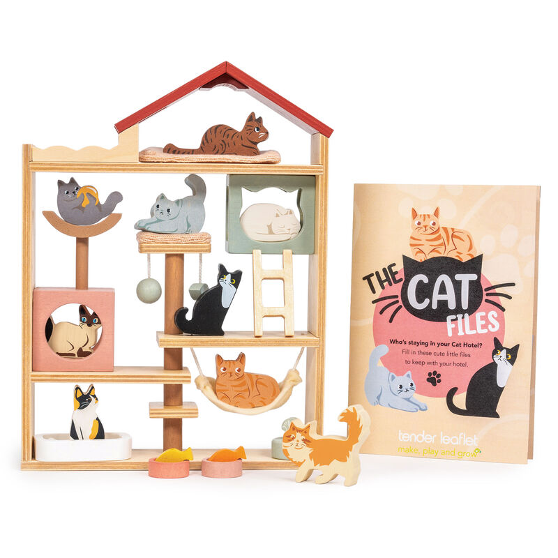 Cat toy set with a wooden house structure and cat-themed accessories on a white background.