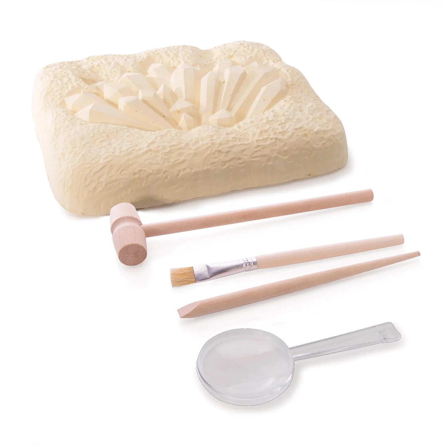 Block resembling clay with  tools including a mold, mallet, brushes, and a magnifier on a white background.