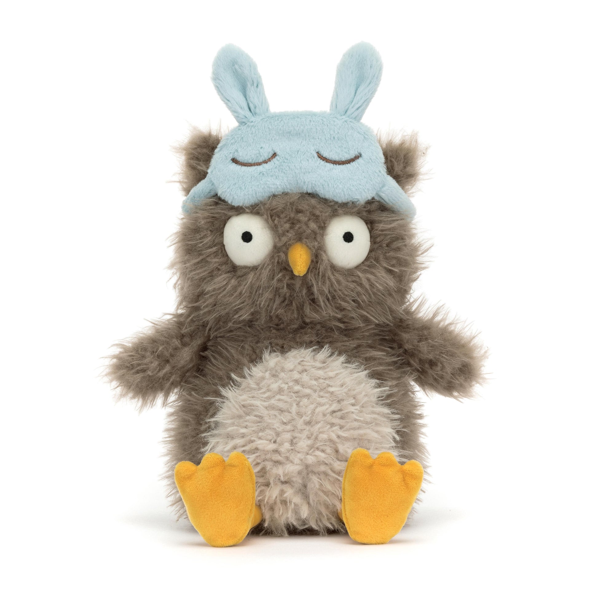 A plush toy depicting an owl with a blue sleeping mask, brown body, beige belly patch, and yellow feet.