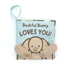 A soft cloth children's activity book with a illustration of a bunny and the text 'Bashful Bunny LOVES YOU!'