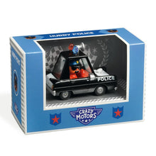 A toy police car with a metallic black finish and a red light on top, packaged in a box with 'Hurry Police' written on it.