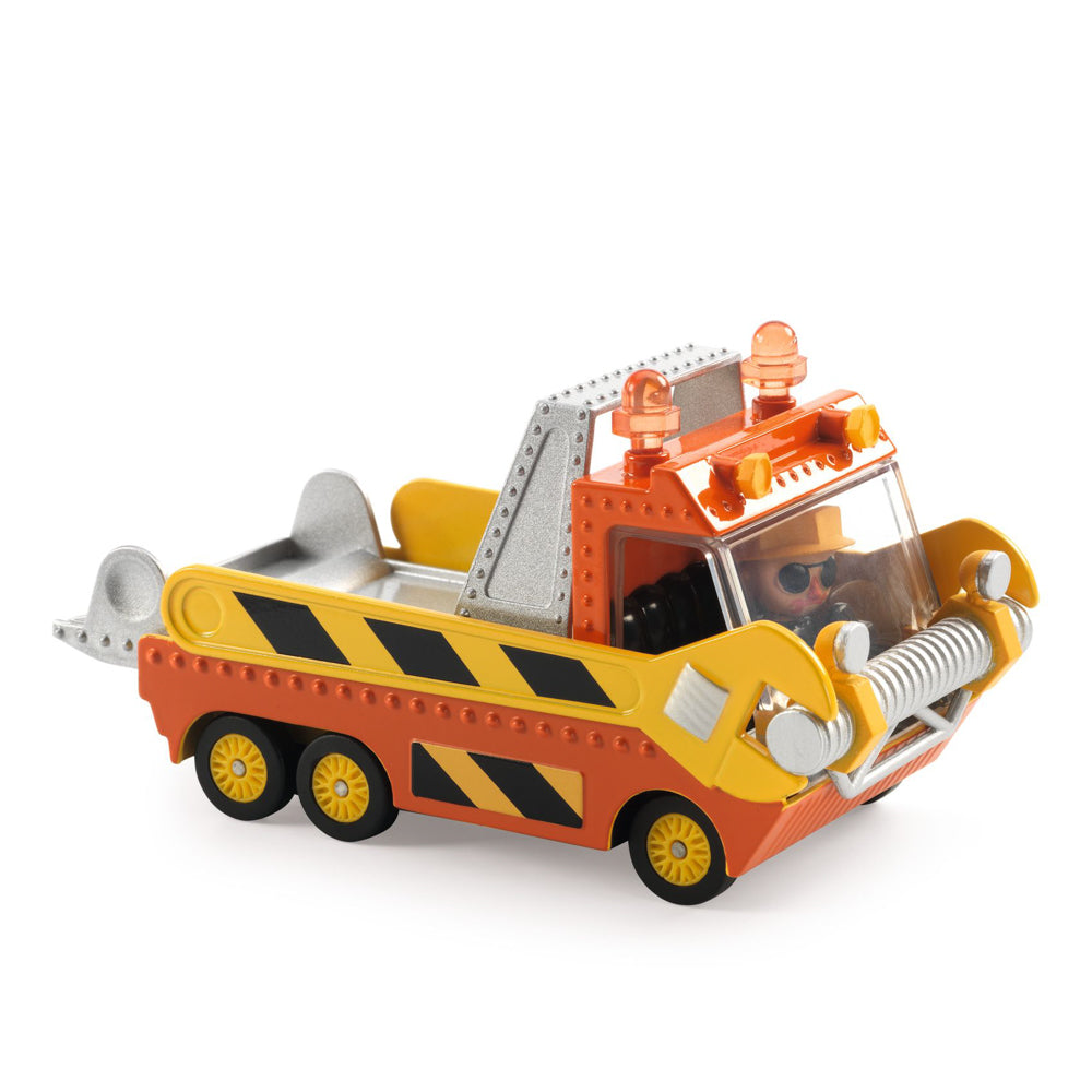 A toy tow truck with a large sliding platform. The truck is primarily yellow with black and orange details. A driver figure is sitting inside the truck.