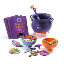Witch soup and potions game with purple cauldron