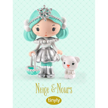 Toy figure with turquoise hair and silver outfit on a light green background, featuring the brand 'tinyly'.