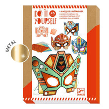 Packaging for a DIY Super Robots Masks craft kit, featuring illustrations of four colorful mask designs with metallic details and a 'Do it yourself' text.
