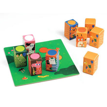 Colorful children's illustrated sound blocks with animal designs on a green base
