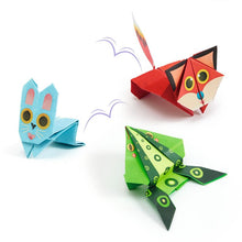 Three colorful paper animals (cat, rabbit, frog) on a white background