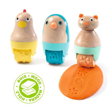 Three wooden dough rollers designed to leave animal-shaped imprints on dough. Each roller has a simple, child-friendly design, featuring a chicken, a sheep, and a mouse.
