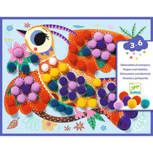 A colorful box packaging of 'Pompom Collage' craft kit featuring illustrations of birds and flowers, with children's craft materials visible.