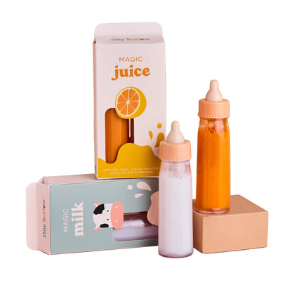 Two bottles labeled 'Magic Juice' and 'Magic Milk' on a beige background