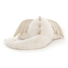 Plush toy dragon on a white background