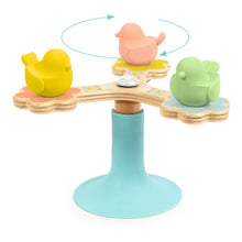 BabySpini toy featuring a spinning top with three colorful birds.