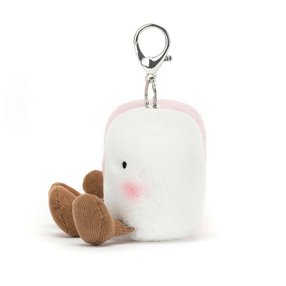 White marshmallow plushie with brown dangle legs, sitting