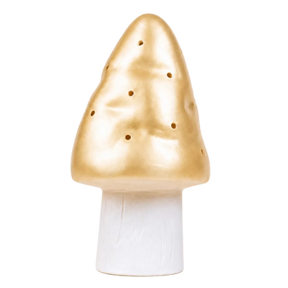 A decorative mushroom-shaped light with metallic gold cap featuring small perforation holes and a white cylindrical base, isolated on a white background.