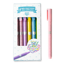 A set of six silver outline pens with multicolored grips, presented in a packaging box. The pens and box feature decorative designs.