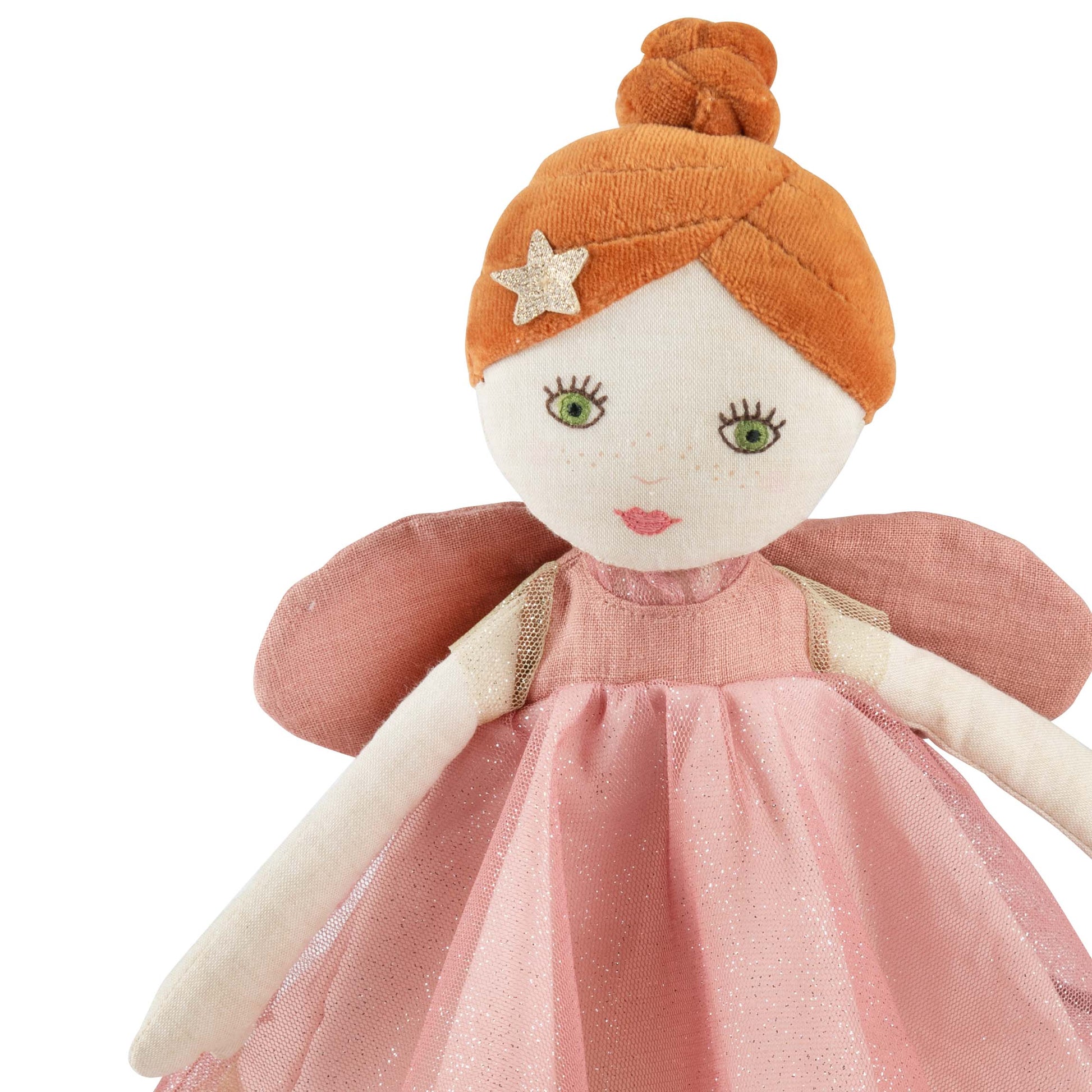 Toy fairy with orange hair and pink dress on a white background