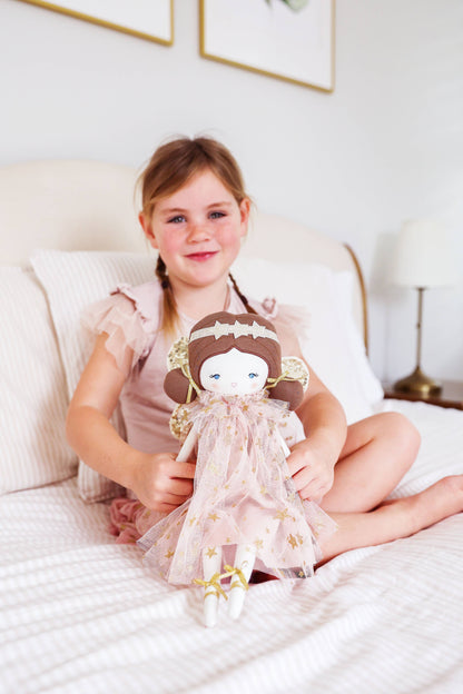 Fleur Fairy rag doll with brown hair, wearing blush and gold fairy dress.