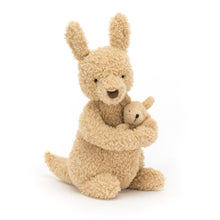 A beige plush kangaroo toy with a baby joey snuggled in its pouch.
