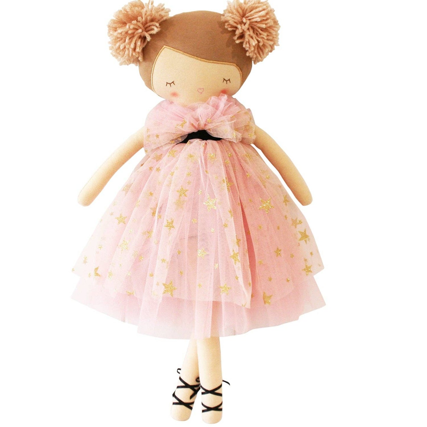 A strawberry blonde, soft-bodied doll with a ballet-style dress adorned with gold stars and delicate face details, standing on two legs.