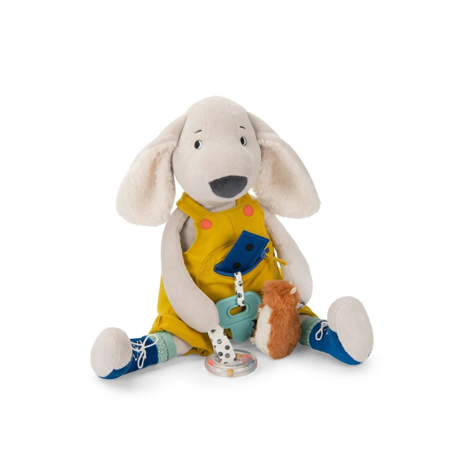 Cream coloured activity go, floppy ears, wearing yellow overalls, dark blue stitched shoes
