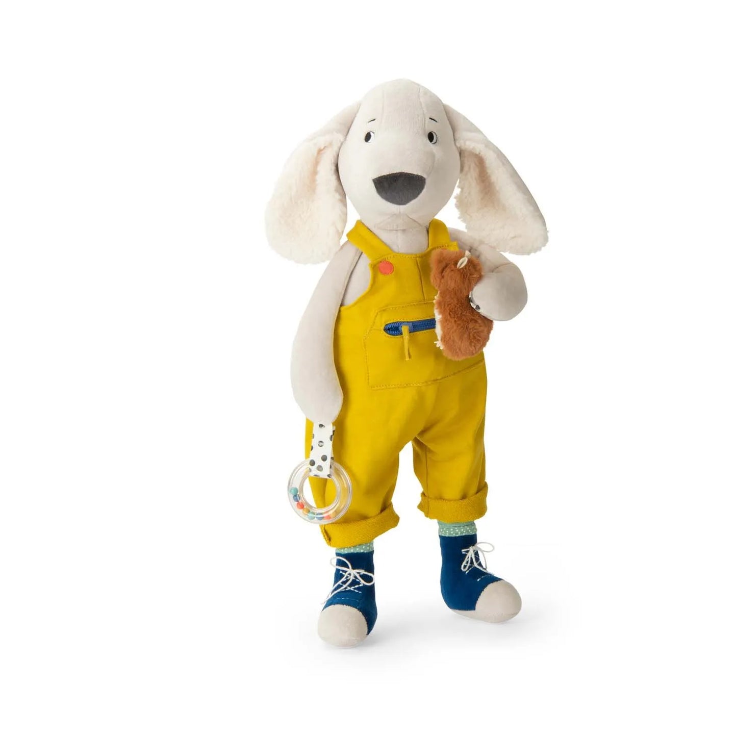 Dog soft toy with floppy cream ears, blue sneakers and yellow overalls, holding a ring rattle and small hamster plush