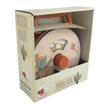 Wind-up tin radio toy with Jungle Animal illustrations, presented in cardboard open-display box