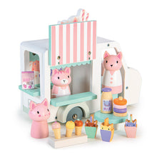 Children's toy set with pink cat characters and various items on a white background