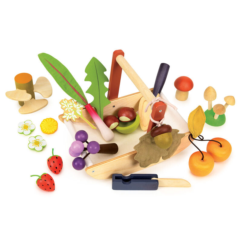 Colorful toy vegetables and fruits set on a white background