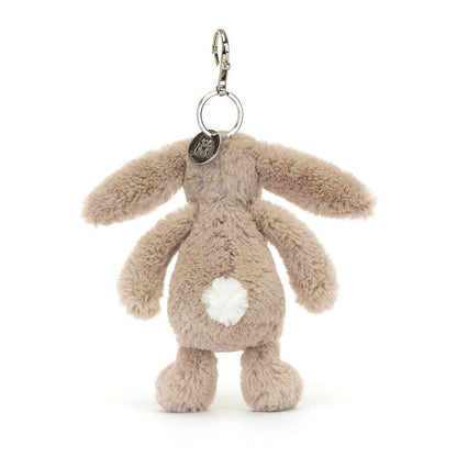 Plush bunny keychain with a white  bob tail on a white background