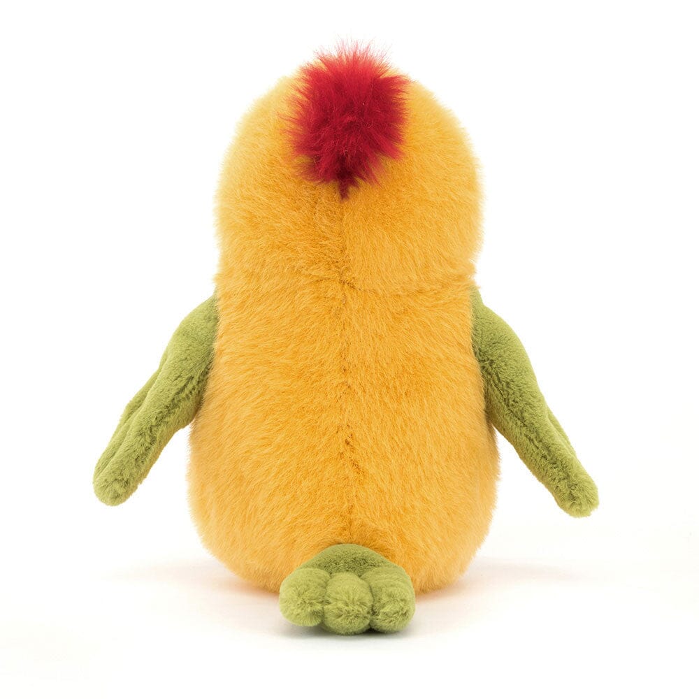Plush toy resembling a penguin with a red top and green arms and feet on a white background