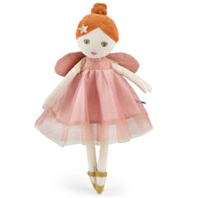 Toy fairy doll with a pink dress and orange hair on a white background