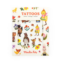 Pack of Moulin Roty tattoos with cartoon characters and flowers on a white background